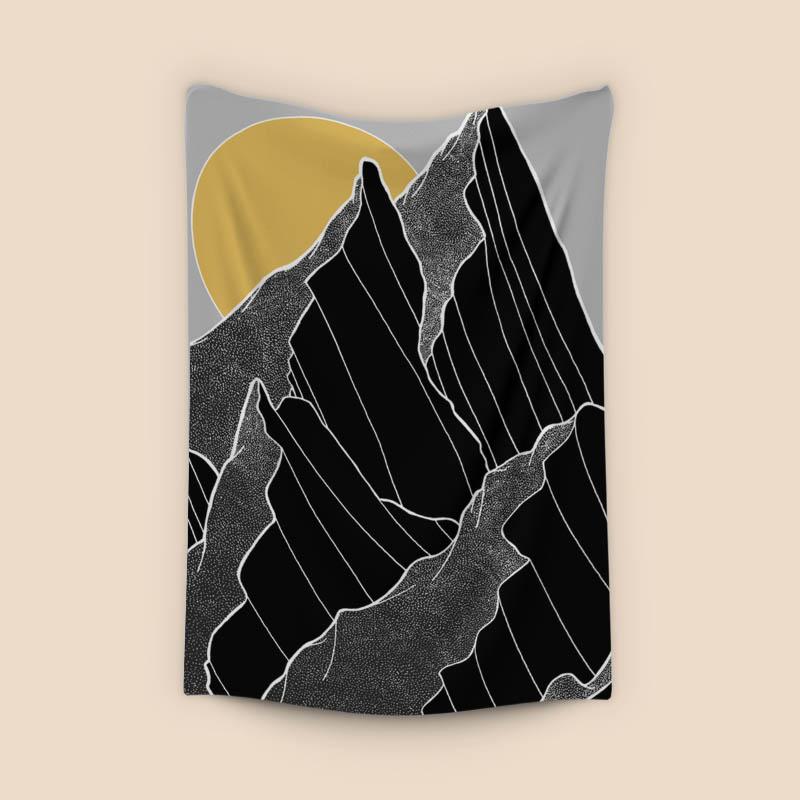 The dark peaks under the golden sun