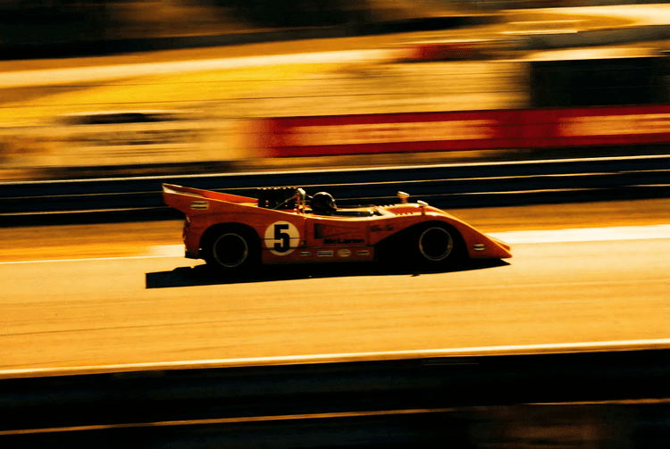 Orange Thunder: McLaren M8 Can-Am Panning Shot