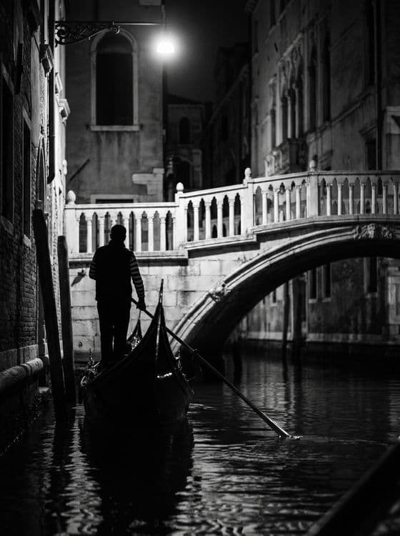Venice Nocturne: Classic Gondolier under the Lamp