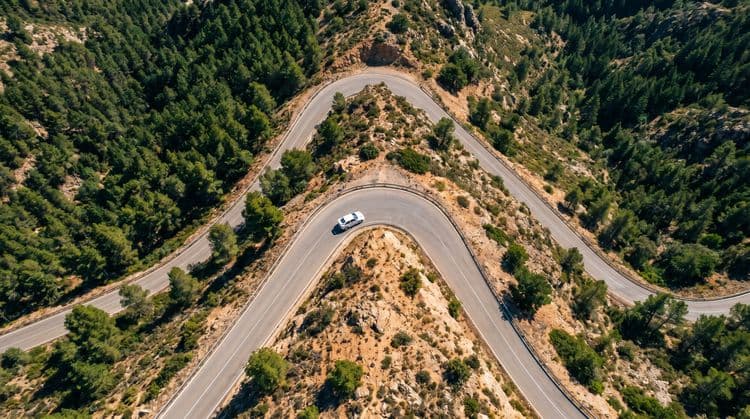 Alpine S-Curves - Winding Mountain Pass Aerial Photography