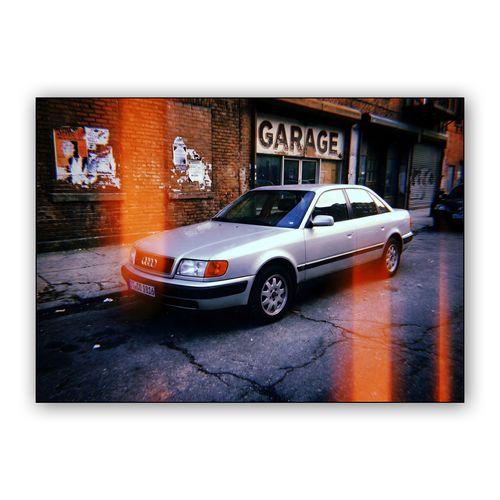 Urban Audi 100: Cinematic Light Leak wall art poster