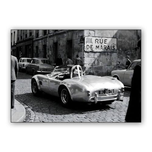 Parisian Pursuit: Shelby Cobra on Rue de Marais wall art poster